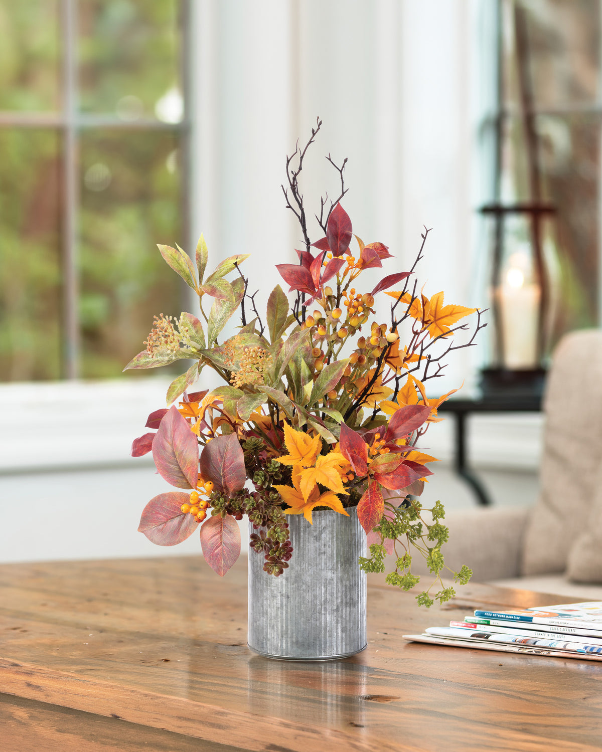 Maple & Sandcherry Autumn Faux Foliage Arrangement. Autumn faux floral arrangement with fall leaves and berries in a galvanized metal vase.