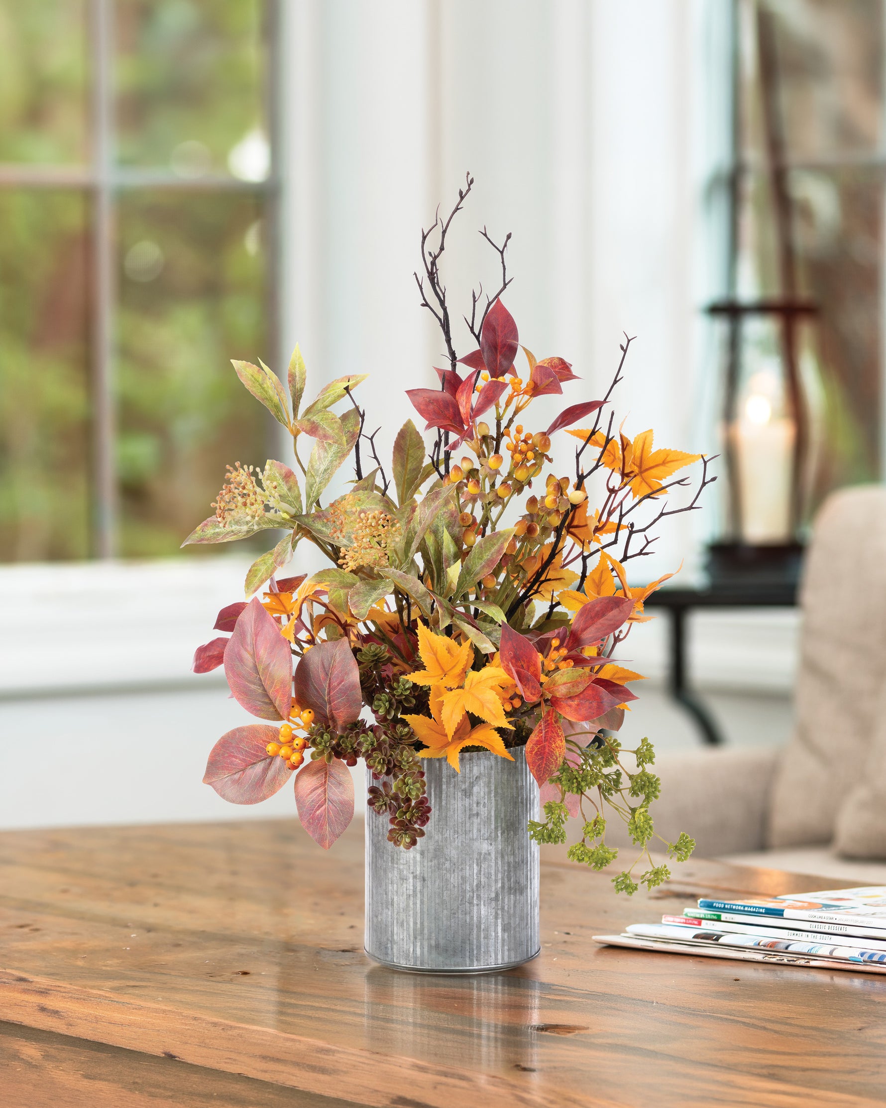 Maple & Sandcherry Autumn Faux Foliage Arrangement. Autumn faux floral arrangement with fall leaves and berries in a galvanized metal vase.